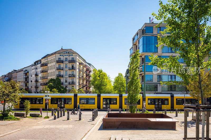 yellow street car in central berlin at sunny day